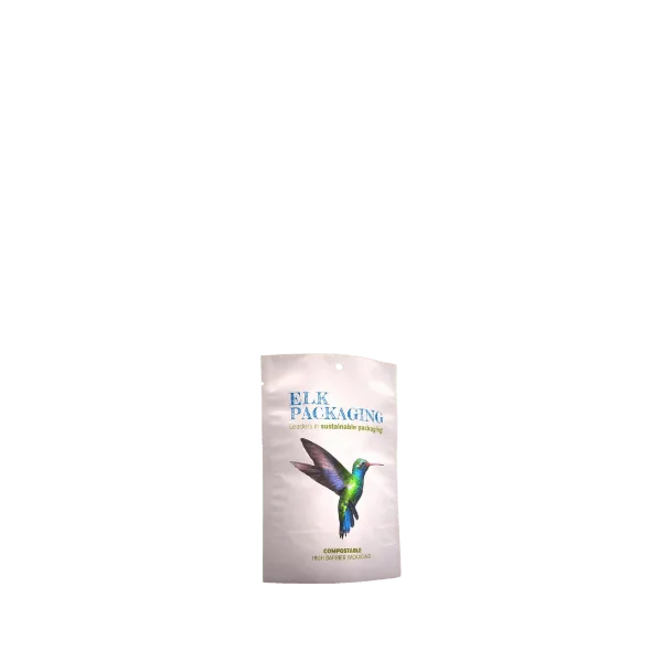 The image displays the Elk Packaging 2.0oz Paper Standup Pouch. The pouch is primarily beige with a smooth, matte finish, and it features a resealable zipper at the top. It stands upright on its own, making it suitable for shelf display.