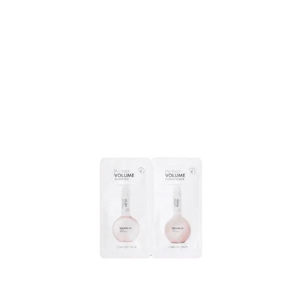 The image depicts the Expack 0.02oz PP Standup Pouch Mono - UniFlat_Tandem 0.5ml. This is a small, clear, and flat plastic pouch designed to stand upright. The pouch has a smooth surface with a sealed top edge and a bottom fold that allows it to expand and stand on its own. The material appears to be durable and flexible, suitable for packaging small quantities of liquid or gel products. The overall design is simple and functional.