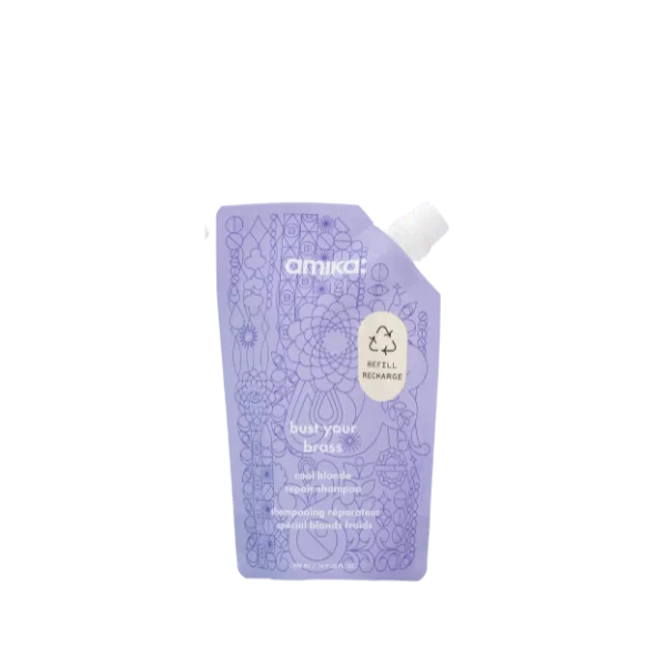 The image shows the Expack 25.0oz PE Pouch (Mono UniSpout 739ml). It is a sleek, transparent plastic pouch with a spout located at the top left corner. The pouch appears to be empty and is standing upright. The spout has a screw cap for easy opening and closing. The overall design is functional and modern, suitable for holding liquid products. The transparency of the pouch allows for the contents to be visible.