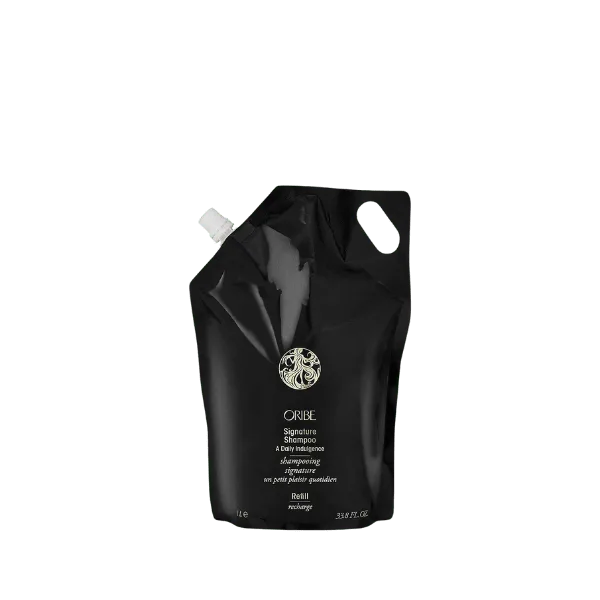 The image displays the Expack 33.8oz PE Pouch Mono UniSpout 1000ml. The pouch is a sleek, rectangular-shaped package with a spout located at the top right corner for easy pouring. The material appears to be smooth and glossy, giving it a modern and clean look. The pouch is shown standing upright, highlighting its sturdy base. The overall design is minimalist, with no visible labels or markings on the pouch itself.