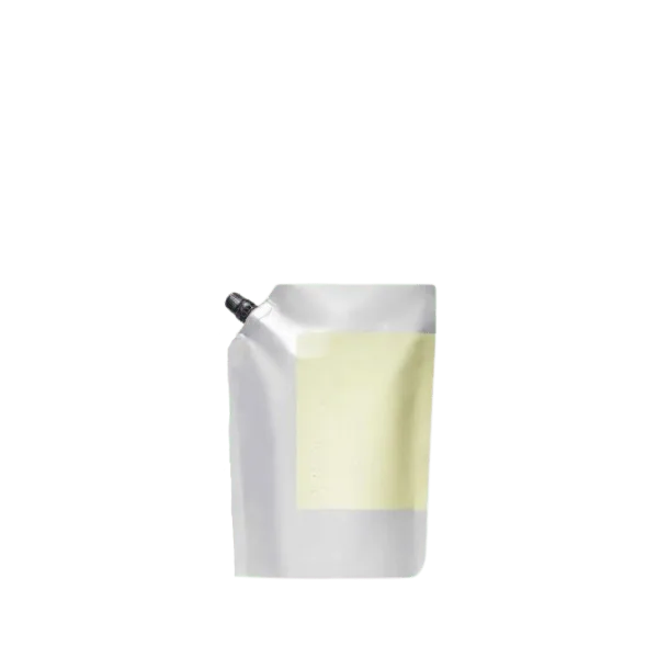 The image shows a 3.4oz PE Pouch Spouted Refill Pouch from Identipak. The pouch is white with minimalist design elements, featuring a spout at the top for easy dispensing. It appears to be made from flexible plastic material and is likely used for containing and dispensing liquid products. The overall design is clean and functional, suitable for various refillable liquid products.
