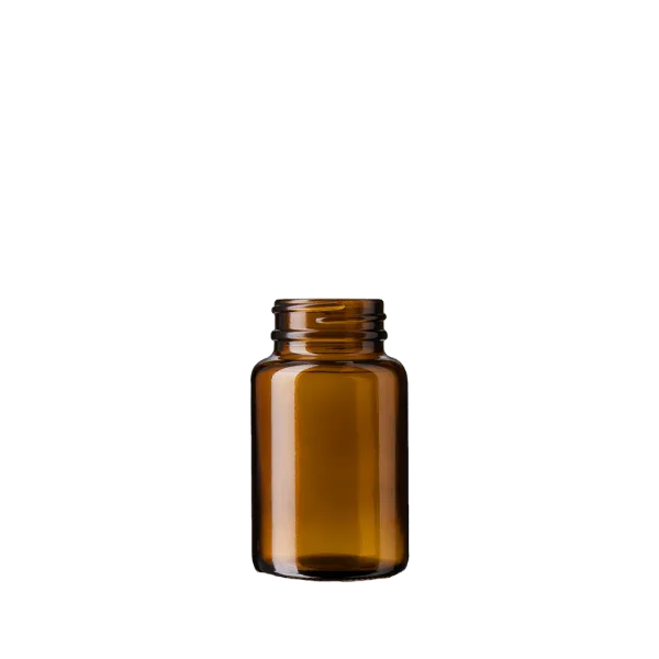 The image shows a Calaso 3.4oz Glass Jar. The jar is clear and cylindrical with a straight-sided design. The glass appears thick and sturdy, offering a transparent view of its contents. The jar has a threaded neck for a secure closure, although the lid is not visible in the image. The base is flat, allowing it to stand upright. The overall appearance is sleek and minimalist, suitable for various uses.