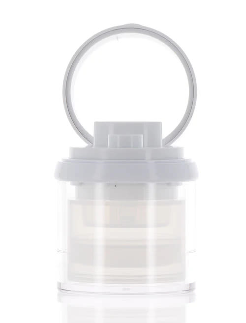 The image displays the APG Packaging 2.0oz Airless Jar (APG-60-WT). The jar is primarily white with a sleek, modern design. It has a cylindrical shape with a smooth, glossy finish. The lid is also white and seamlessly fits the jar, maintaining a uniform appearance. The airless feature is designed to protect the contents from air exposure. The overall look is clean and minimalistic, suitable for various cosmetic or skincare products.