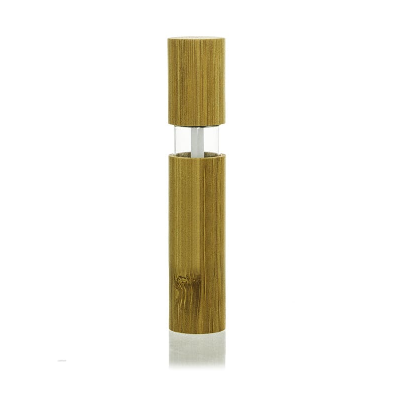 The image features the APG Packaging 0.3oz Mixed Material Lip Gloss Tube. The lip gloss tube has a sleek, cylindrical design with a transparent body, allowing the product inside to be visible. It has a shiny silver cap that adds a touch of elegance to the overall look. The applicator wand is attached to the cap and appears to be a standard doe-foot applicator, designed for easy and precise application of the lip gloss. The tube is compact and portable, making it ideal for carrying in a purse or makeup bag.