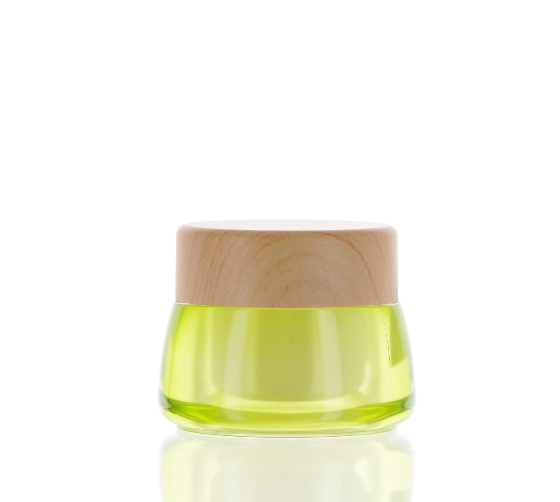The image shows the APG Packaging 0.9oz Mixed Material Jar (APG-08-25-CG). The jar has a sleek, cylindrical shape with a smooth, translucent body and a solid white cap. The cap appears to be screw-on, providing a secure closure. The overall design is minimalist and modern, ideal for holding small amounts of creams, gels, or other cosmetic products.