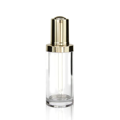 The image features a clear glass dropper bottle with a gold-colored dropper cap. The product is the "APG Packaging 1.7oz Glass Dropper Bottle (APG-2069F-30-GD)." The bottle is cylindrical with smooth, clean lines and a simple, elegant design. The gold dropper cap adds a touch of luxury to the overall appearance.