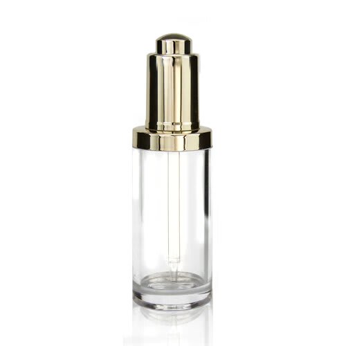 The image shows the APG Packaging 1.7oz Glass Dropper Bottle (APG-2069F-30-GD). It features a clear glass bottle with a cylindrical shape and a gold-colored dropper cap. The dropper cap includes a white rubber bulb for dispensing liquid. The bottle is empty and stands upright, showcasing its sleek and elegant design.
