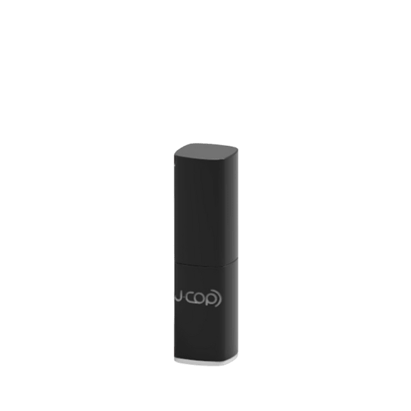 The image displays a JCOP Korea 0.1oz PP Lip Stick (LPNS030). The lip stick is housed in a sleek, cylindrical container made of a solid, matte black plastic material. The container has a simple and modern design with smooth surfaces and clean lines. The top cap is slightly rounded, and the bottom part of the container is flat, allowing the product to stand upright. There are no visible labels, text, or logos on the container, giving it a minimalist and elegant appearance.