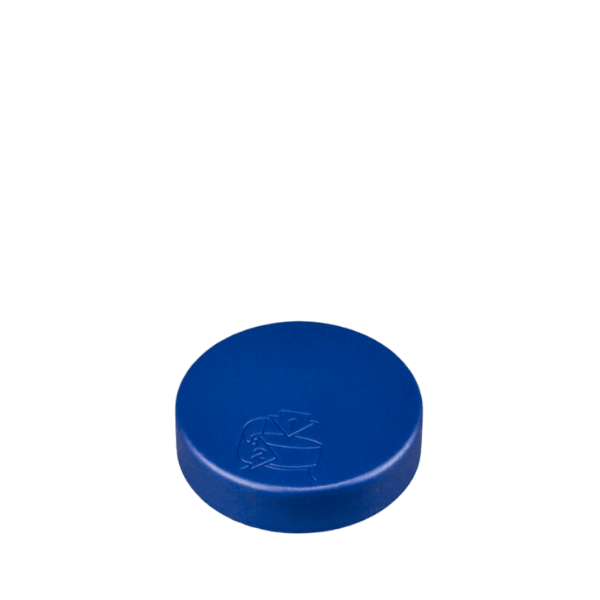 The image shows a Mold-Rite Plastics PP Threaded Closure, 63-400. The closure is cylindrical with a flat top and threaded sides. It is designed to fit onto the neck of a compatible container. The surface appears smooth and the color is a solid, neutral tone, likely white or light gray. The threading is visible on the interior side of the closure, indicating where it would screw onto a container. The design is simple and utilitarian, focusing on functionality.