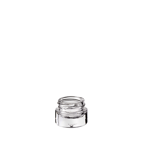 The image shows a clear glass container known as the Calaso 0.2oz Glass Jar. The jar has a smooth, cylindrical shape with a wide mouth and a flat base. The transparency of the glass allows the contents inside to be visible. This small jar is suitable for holding tiny amounts of product, such as cosmetics or ointments. The simplicity and clarity of the design give it a clean and elegant appearance.