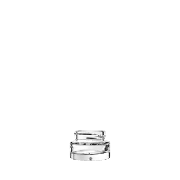 The image shows a clear glass jar named "Calaso 0.5oz Glass Jar." The jar features a cylindrical shape with a smooth surface and a wide, round opening. The glass is transparent, allowing visibility of the contents inside. The jar's design is simple and elegant, suitable for holding small quantities of products such as creams, balms, or other cosmetics. The overall appearance is clean and minimalist.