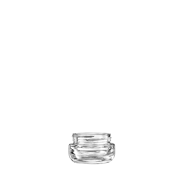 The image features the Calaso 1.0oz Glass Jar HM14010-100. The jar is clear and cylindrical with a smooth, seamless surface. It has a wide, round opening at the top, making it suitable for storing creams, balms, or other small quantities of products. The glass appears thick and sturdy, providing a high-quality look and feel. The jar does not have any labels or markings, showcasing its clean and minimalist design.