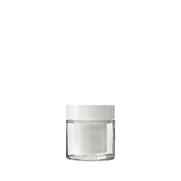 The image shows the Calaso 3.3oz Glass Jar. It is a clear, cylindrical glass jar with smooth, straight sides and a wide opening at the top. The jar appears to be empty and has a simple, minimalist design. The glass is transparent, allowing the contents of the jar to be visible when filled. The jar has a flat base that enables it to stand upright.