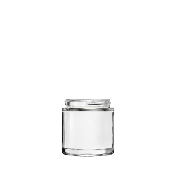 The image depicts the Calaso 3.4oz Glass Jar. The jar has a clear, cylindrical body with smooth, straight sides and a wide-mouth opening. The glass appears thick and high-quality, and the jar is empty with no lid visible in the image. The base of the jar is slightly thicker, providing stability when placed on a surface. The overall design is simple and elegant, suitable for storing various contents.