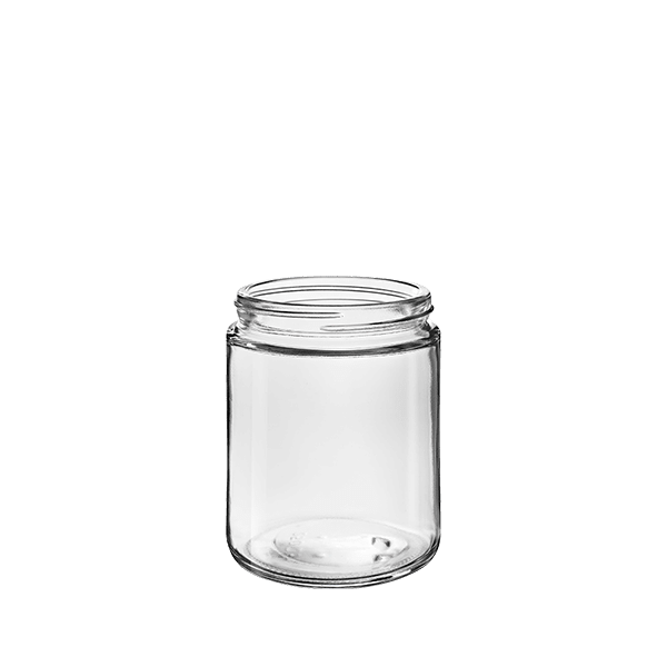 The image showcases the Calaso 8.5oz Glass Jar by Glasmeister. The jar is cylindrical with a clear, smooth glass surface, allowing visibility of its contents. It features a wide mouth opening, suitable for easy filling and dispensing. The jar is empty, and there is no lid visible in the image. The overall design is simple and elegant, making it versatile for various uses.
