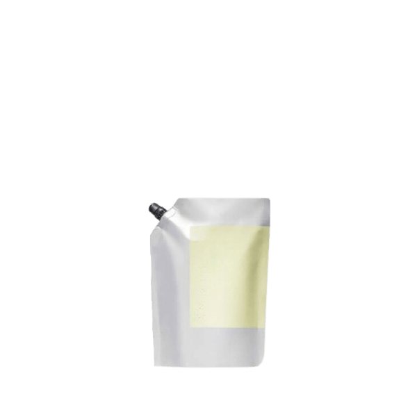 The image shows the Identipak 1.7oz PE Pouch, Spouted Refill Pouch. The pouch is white with a smooth, glossy finish and has a spout at the top for easy dispensing. The shape of the pouch is flexible and designed to stand upright. The spout is capped with a screw-on lid. The overall design is minimalistic and functional, suitable for holding liquids or semi-liquids.