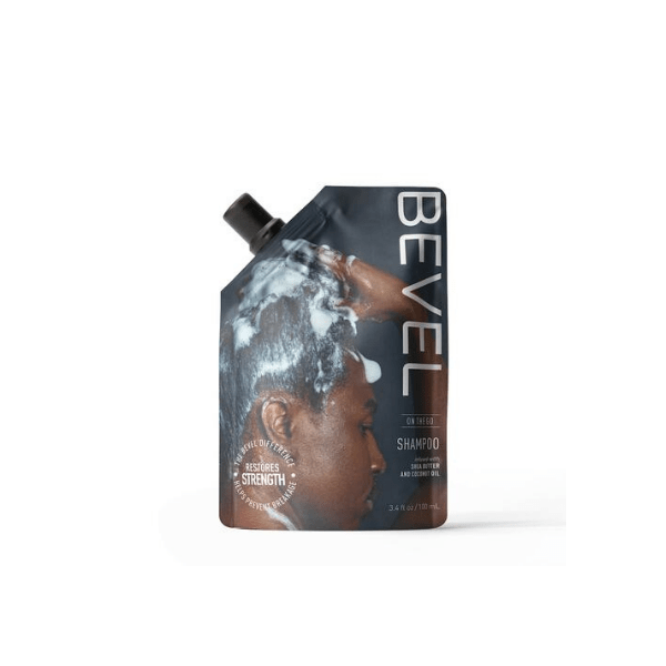 The image shows a 33.8oz PE Pouch Mono UniSpout 1000ml. The pouch is predominantly white with a smooth surface and has a spout located at the top for easy pouring. It is designed to stand upright and has a simple, clean design with no visible branding or labels. The pouch is sealed at the top, sides, and bottom, ensuring the contents remain secure. The spout is equipped with a cap, adding convenience for dispensing and re-sealing.