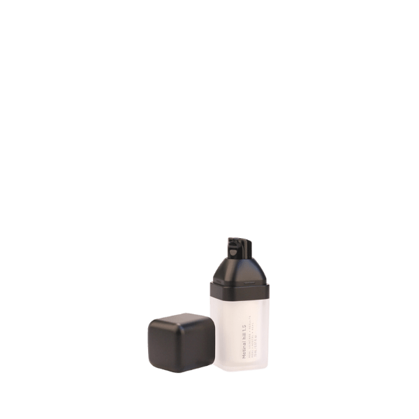 The image shows the Garrett Hewitt International 0.5oz PMMA Airless Bottle, model GRK-15. The bottle is cylindrical with a sleek and modern design. It features a clear outer shell made of PMMA (polymethyl methacrylate) which encases an opaque inner container. The top of the bottle has a pump dispenser with a smooth, glossy finish. The overall appearance of the bottle is elegant and minimalist, suitable for high-end cosmetic products.