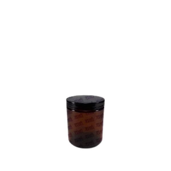 The image depicts the "Jerhel Plastics Inc. 7.5oz Glass Jar (JI-2101)." The jar has a cylindrical shape with a smooth, clear glass body. It features a wide mouth opening at the top, designed for easy access and filling. The jar is empty and does not have a lid attached in the image. The glass is transparent, showcasing its clarity and simplicity. The overall design is sleek and functional, suitable for various storage needs.