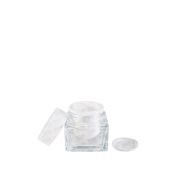 The image shows a clear glass jar with a cylindrical shape and a smooth, flat base. The jar has a wide opening at the top, suitable for a screw-on lid. The product name is "Jerhel Plastics Inc. 0.3oz Glass Jar (JI-2197)."