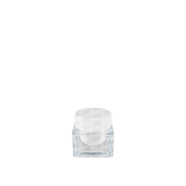 The image features the Jerhel Plastics Inc. 0.3oz Glass Jar (JI-2197). It is a small, clear glass jar with a cylindrical shape. The jar has a smooth, transparent body and a wide opening at the top. The lid is not visible in this image, focusing solely on the jar itself.