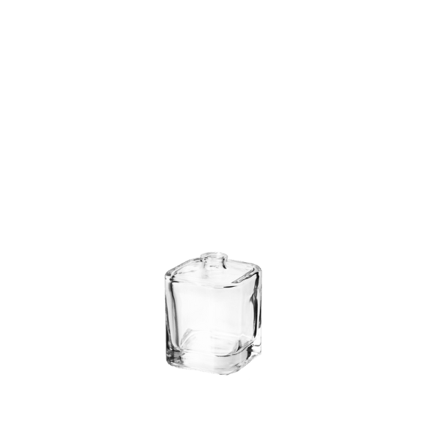 The image shows the Calaso 1.7oz Glass Bottle in Azalea. It is a clear, cylindrical glass bottle with a smooth surface and a slightly curved shoulder leading to a narrow neck. The bottle is capped with a sleek, shiny silver cap that adds a touch of elegance to the overall design. The transparent nature of the glass allows the contents inside to be visible, and the bottle stands upright on a flat base.