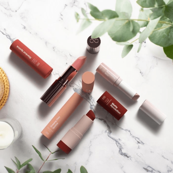 Quadpack refillable aluminum lipstick packaging with sustainable design features