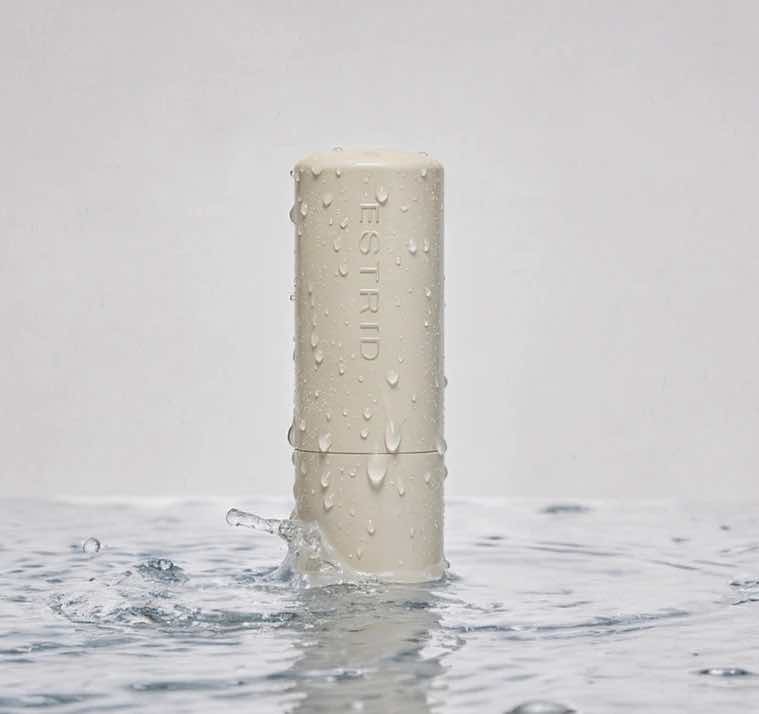 Estrid refillable antiperspirant cylindrical stick and case