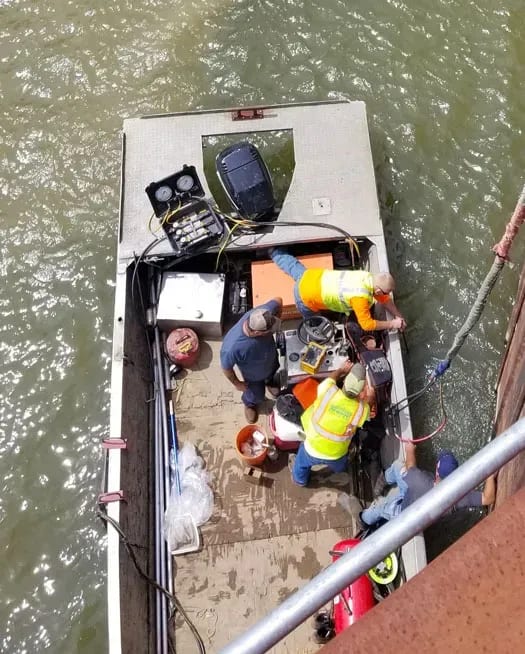 Aerial shot of URETEK techinicans on barge