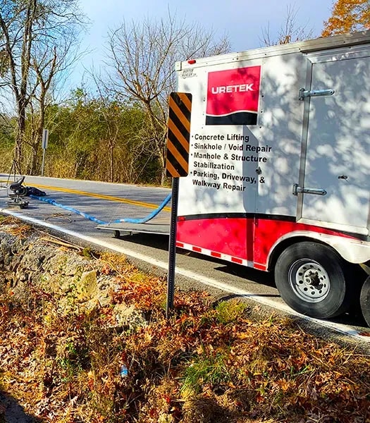 URETEK truck next on side of roadway