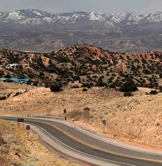 New Mexico roadway with mountains in background