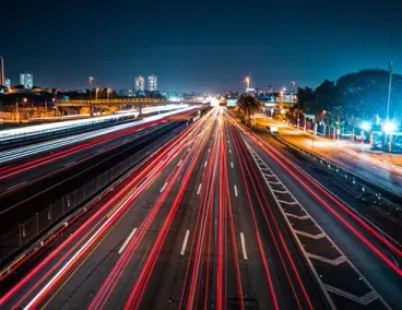 Highway with taillights streaking