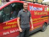 HOME HEATING LTD Logo