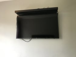 TV was on a stand at the bottom of bed taking  up to much room, now wall mounted plus shelf.