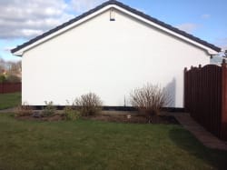 gable wall of teh property in Cumbria after spraying.