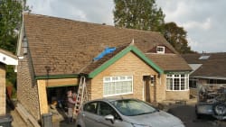 roof before cleaning and nee pvc facias guttering and dry verge systems and new dry valley