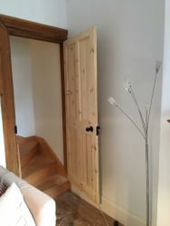 Pine panel door fitted to staircase entrance