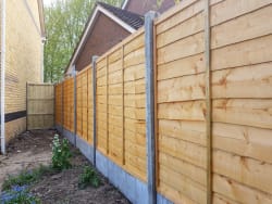 5 Foot High Overlap Panels with CRS Concrete Posts & 1 Foot high Concrete Gravel Boards