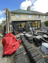 Re-roof from slate to grey Marley modern tiles