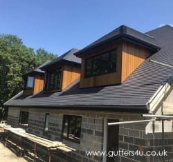 Anthracite grey aluminium fascia, soffit, seamless gutter and pipe RAL 7016
