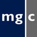 M G Construction logo