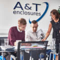 A & T Enclosures logo