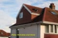 Peter Nicholas and Sons Roofing logo