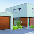 W M Garage Doors logo
