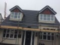 R T Daley Roofing logo