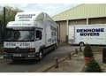 Denhome The Movers logo