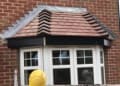 M & M Roofing logo