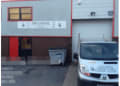 Wolverine Garage Doors. logo