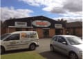 The Garage Door Centre. logo