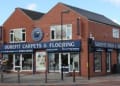 Surefit Carpets logo